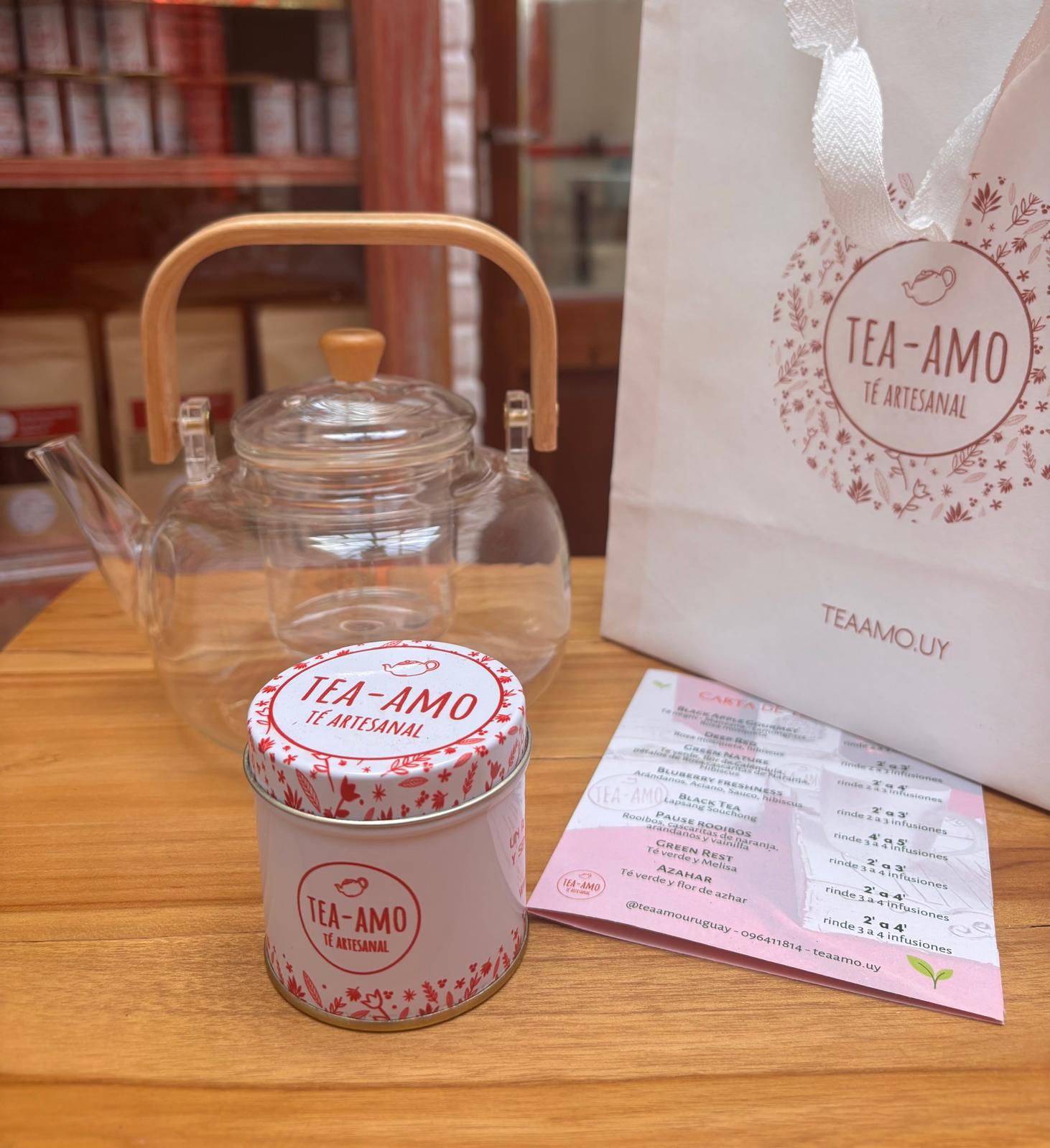 Tetera de vidrio + latita con té